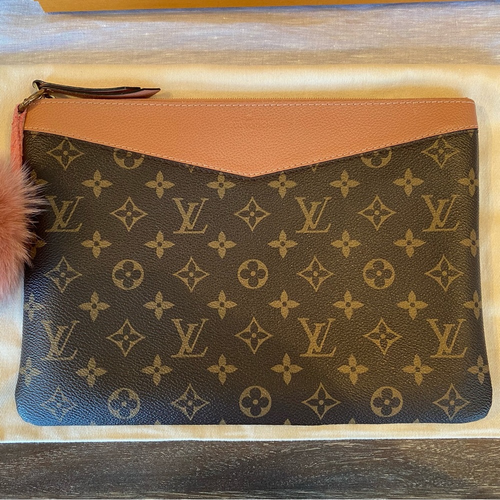 Authentic Louis Vuitton Daily Pouch Peach (rare color) Clutch